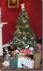 The pile of presents almost hiding the tree!